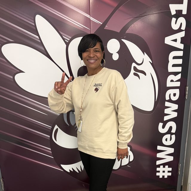Customer wearing a custom embroidered sweatshirt