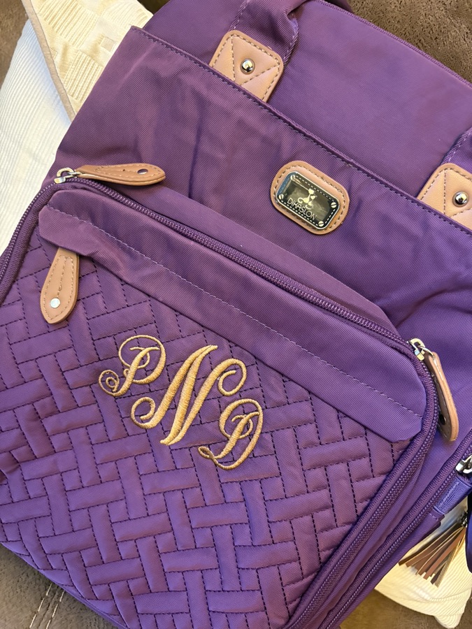 Purple woven bag personalized with an embroidered gold monogram
